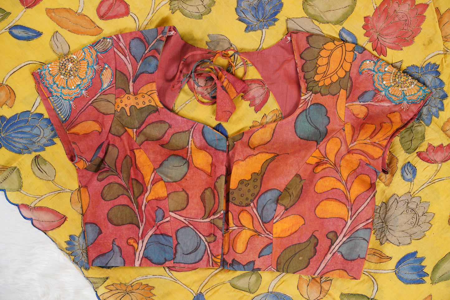 Yellow Floral Kalamkaari with pink Blouse with aari work