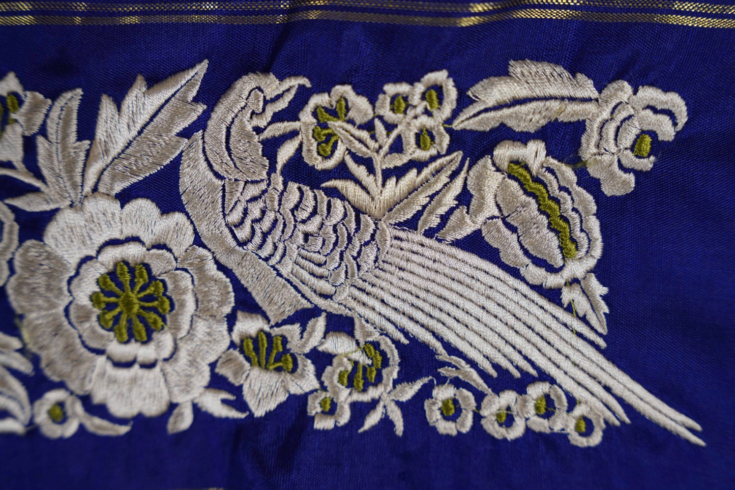 Kanchi Olive green kanchi with blue border and parsi ghara work