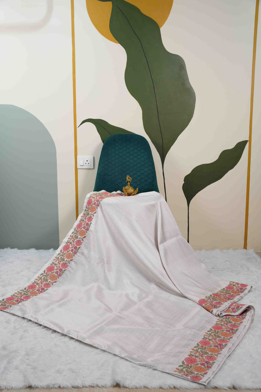 Silver Brocade Kanchi Saree with Orange & Pink Floral Petite Border