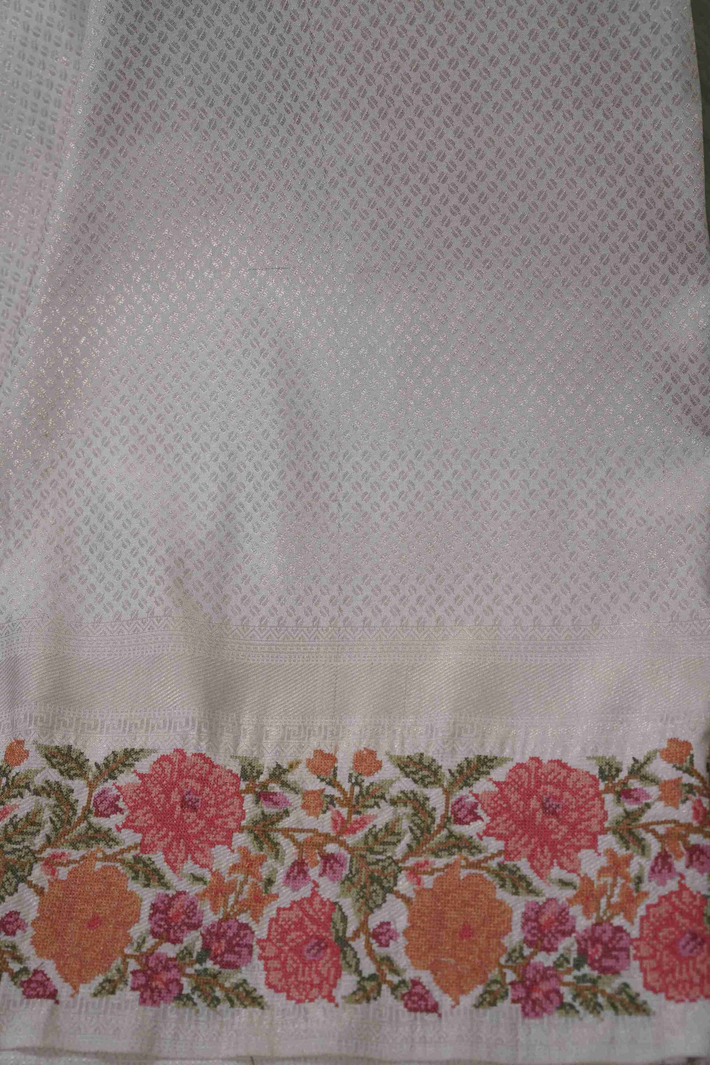 Silver Brocade Kanchi Saree with Orange & Pink Floral Petite Border