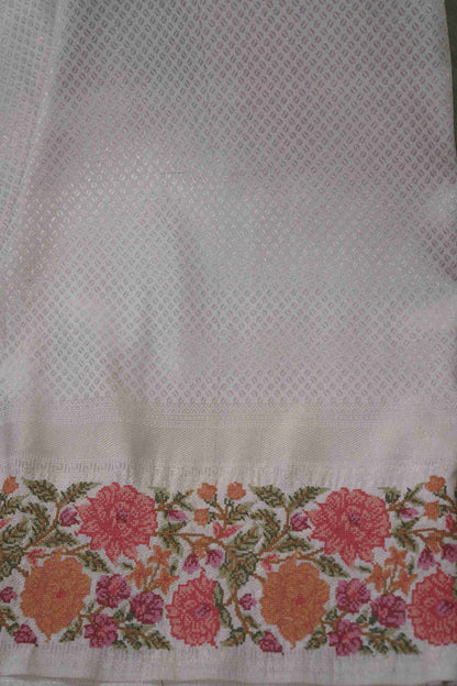 Silver Brocade Kanchi Saree with Orange & Pink Floral Petite Border